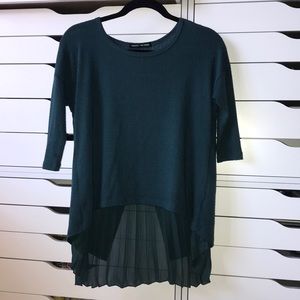 Teal shirt with pleating the back